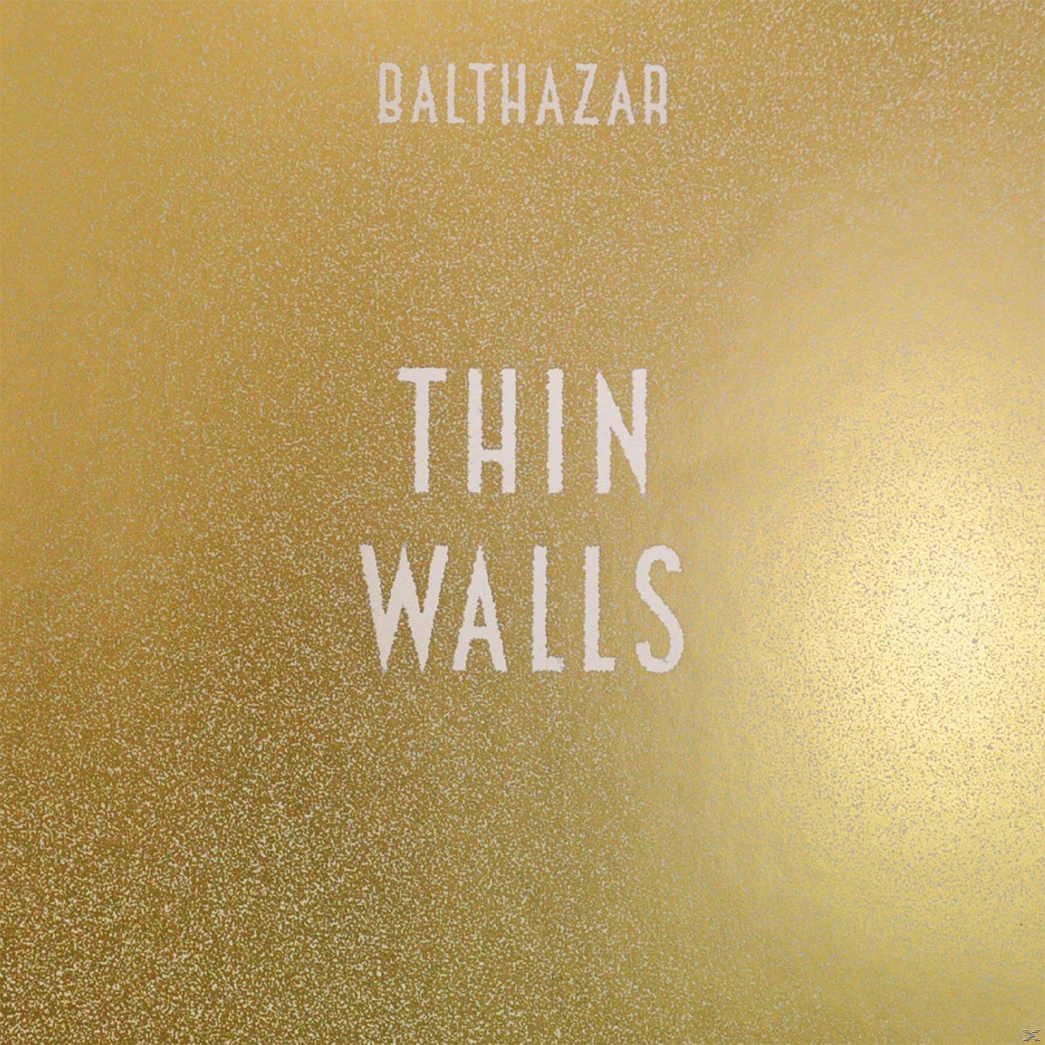 Albumcover mit goldenem Hintergrund und dem weißen Text 'Thin Walls' mit dem Bandnamen 'Balthazar'.