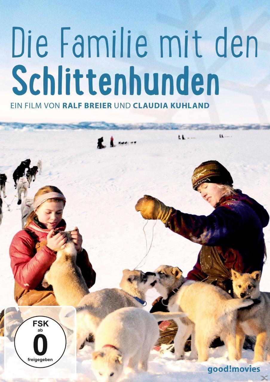 DVD-Cover eines Films mit zwei Kindern und Hunden im Schnee.