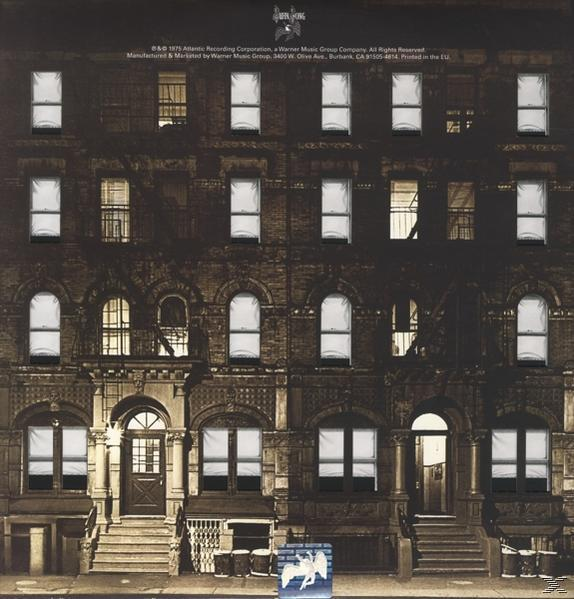 Albumcover, Backsteingebäude mit vielen Fenstern, dunkel, Titel 'Physical Graffiti'.