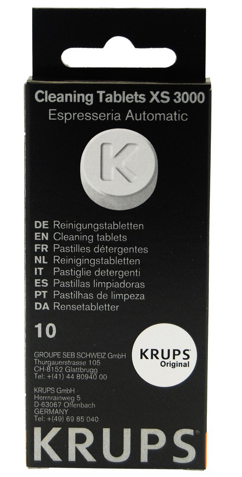 Boîte noire avec texte 'Cleaning Tablets', image de comprimé et logo 'KRUPS'.