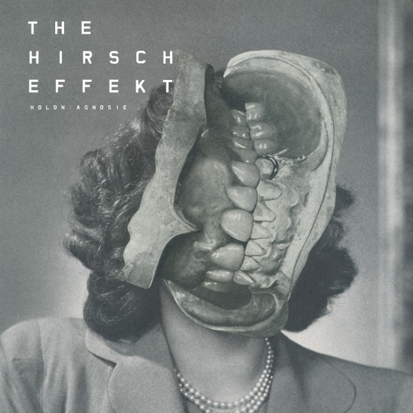 Albumcover: Das Gesicht einer Frau mit einem Schädel verschmolzen. Schwarz-Weiß, mit Bandname oben.