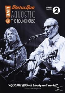 DVD-Cover von Status Quo Live @ The Roundhouse. Zwei Männer spielen Gitarre auf der Bühne.