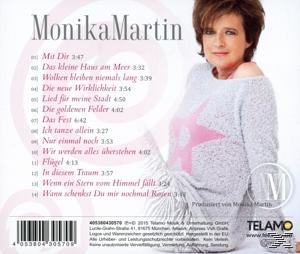 Albumcover: Monika Martin. Titel und Titelliste links, Künstlerbild rechts. Rosa Stern auf Pullover.