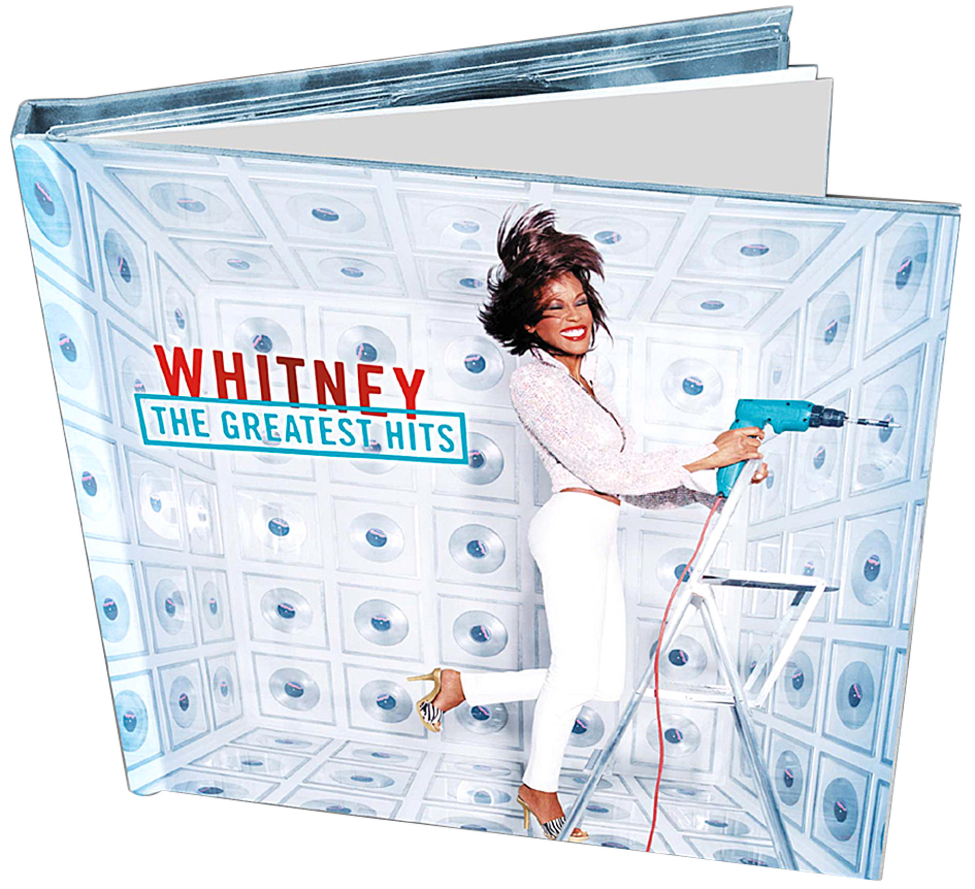 Albumcover. Whitney Houston mit Bohrmaschine auf einer Leiter. Weißer Raum mit Plattenförmigen Designs.
