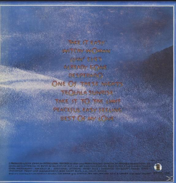 Album-Rückseite. Songtitel auf blauem Hintergrund. Text unten. Eagles Album.
