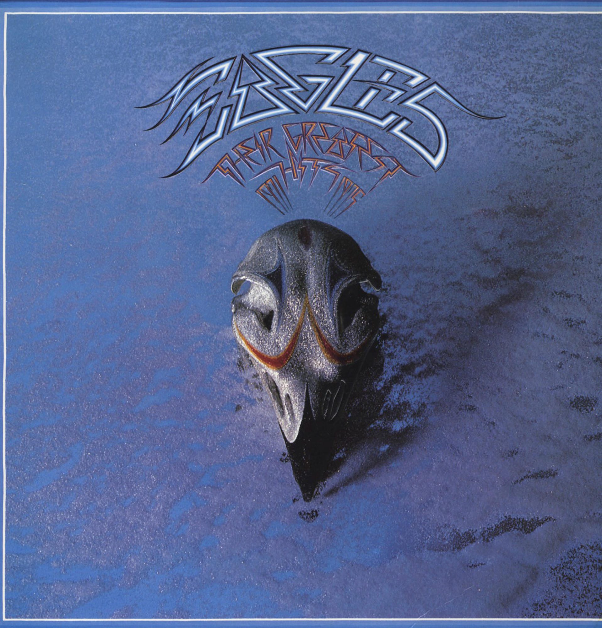 Eagles' Albumcover, Totenkopf auf blauem Hintergrund, mit weißem Rand.