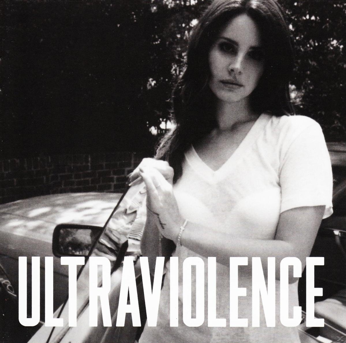 Zwart-wit foto van Lana Del Rey voor een auto, met de albumtitel.