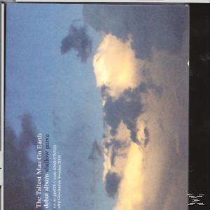 Albumcover mit Wolken und Skyline, mit Text.