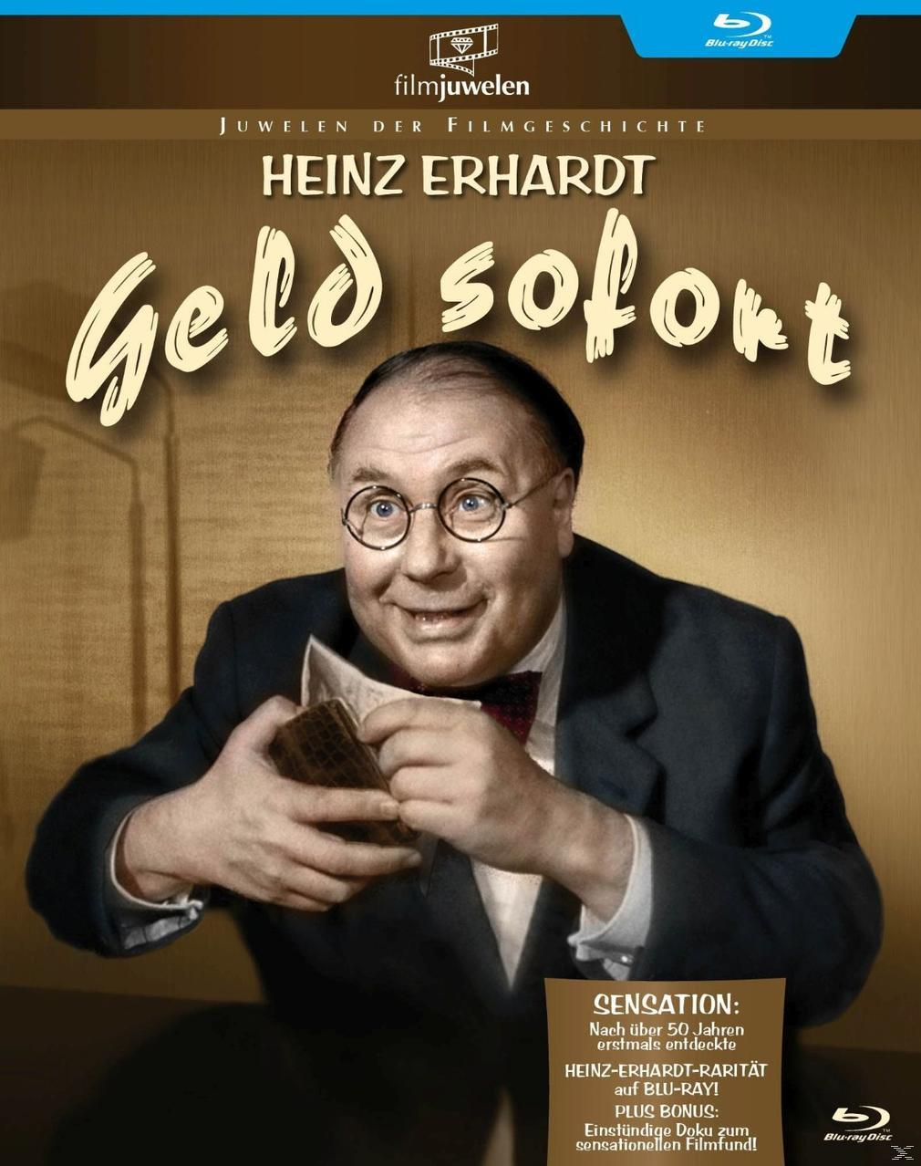 Filmcover. Heinz Erhardt mit Brille und Lächeln, hält Geld. Der Titel lautet 'Geld sofort'.