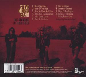 Album-Rückseite. Drei Personen vor rotem Hintergrund. Text: 'Steve Morse Band'.