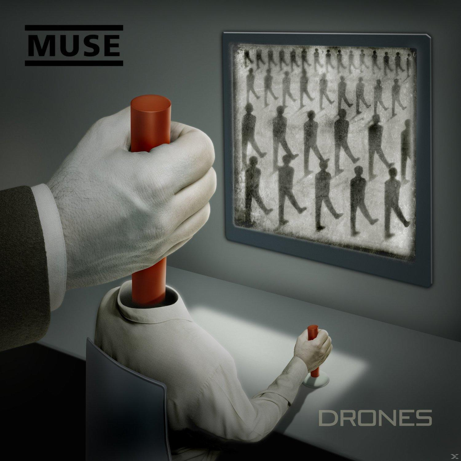 Albumcover mit einer Hand, die einen roten Stab in eine kopflose Figur steckt. Muse-Text.
