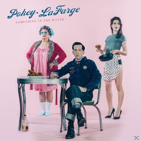 Albumcover: Mann am Tisch mit zwei Frauen. Mann sitzt, Frauen stehen. Pinker Hintergrund. Titel: 'Pokey La Farge'.