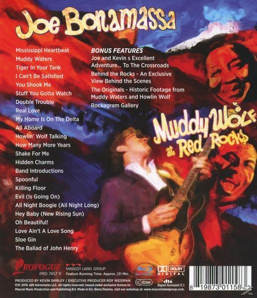 Joe Bonamassa CD tok hátlapja. Élő fotó, számlista és bónuszok. Piros és kék tónusok.