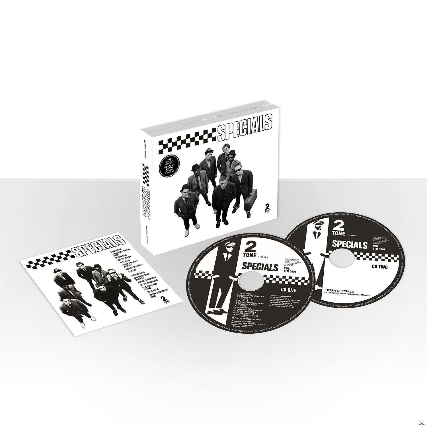 Album borító. CD-box szett a The Specials tagjaival, CD-k és egy füzet.