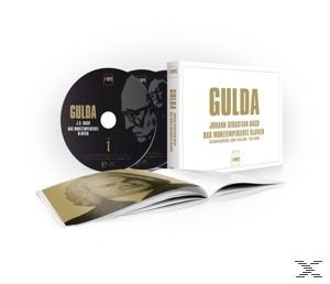 CD-Set mit zwei CDs, Broschüre und Box. Weißer Hintergrund. Goldener Text mit der Aufschrift "GULDA".
