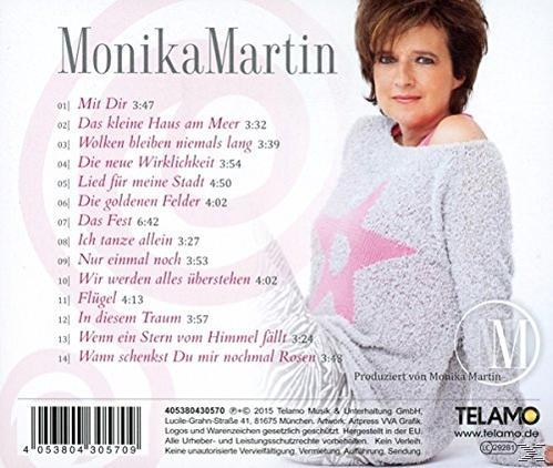 Rückseite einer Monika Martin CD. Enthält Titelliste, Künstlerfoto und Text auf Deutsch.