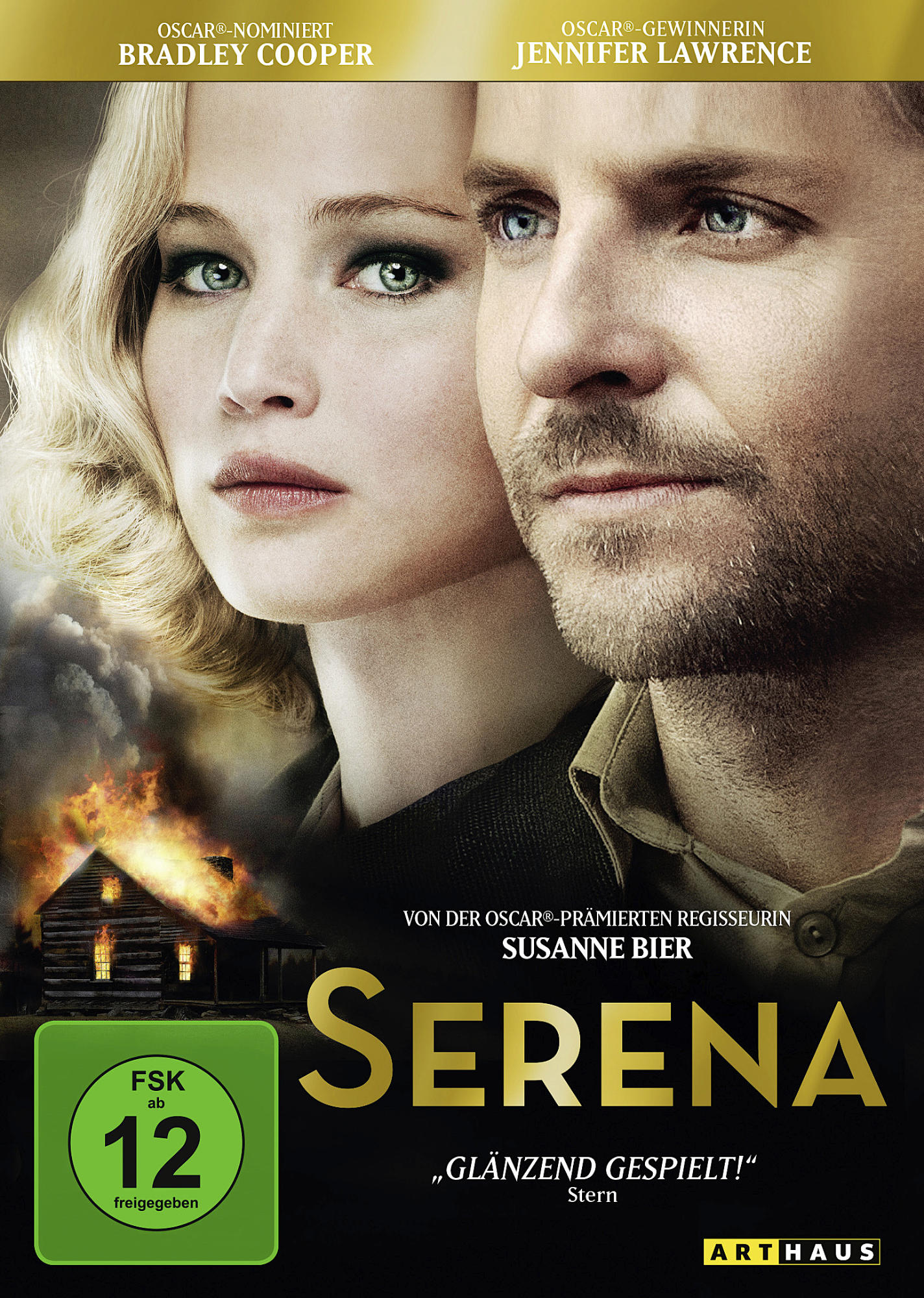 DVD-Cover: Jennifer Lawrence, Bradley Cooper, Filmtitel 'Serena', brennendes Haus.