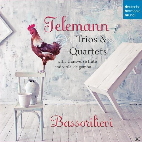 Albumcover mit Hahn auf einem Stuhl, weißem Tisch und Text über Telemanns Trios & Quartette.
