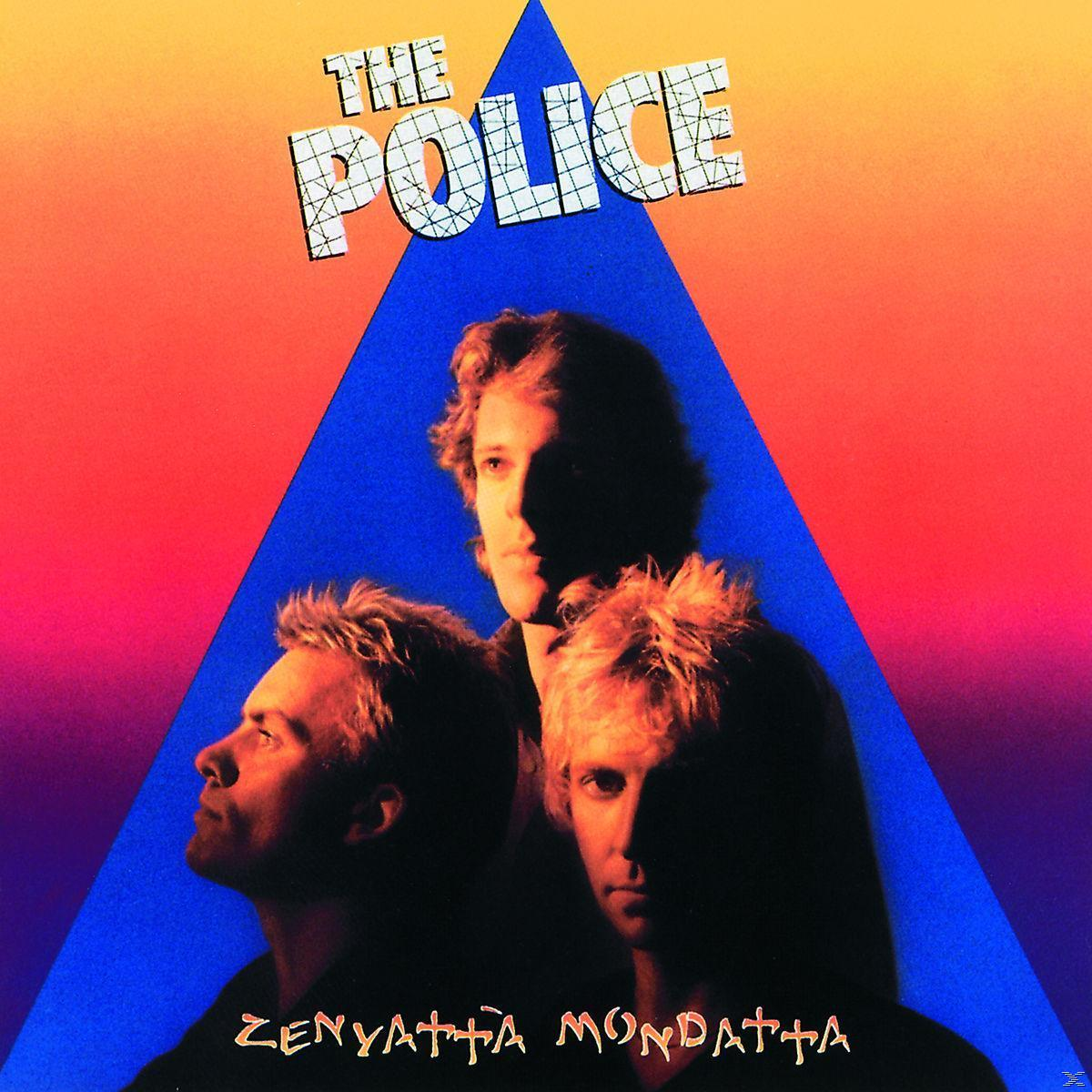 Albumcover mit drei Männern vor einem Dreieck mit dem Wort 'POLICE' oben.