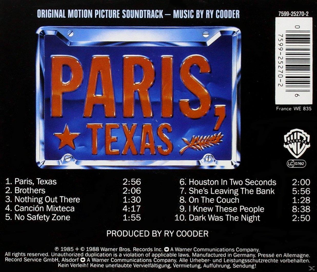 Albumcover: Paris, Texas Nummernschild-Design auf blauem Hintergrund mit Titelliste.