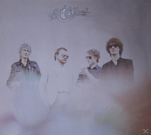 Albumcover für 'The Clean' mit vier Männern in Anzügen, leicht verschwommen.