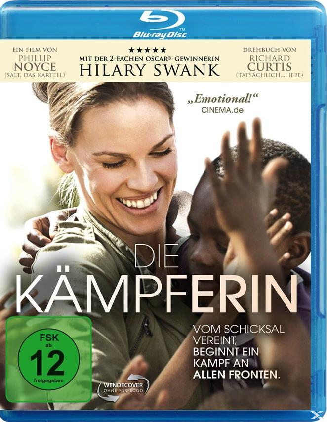 Blu-ray-Cover mit Hilary Swank und einem Kind. Text auf Deutsch: Die Kämpferin. Inklusive Bewertung.