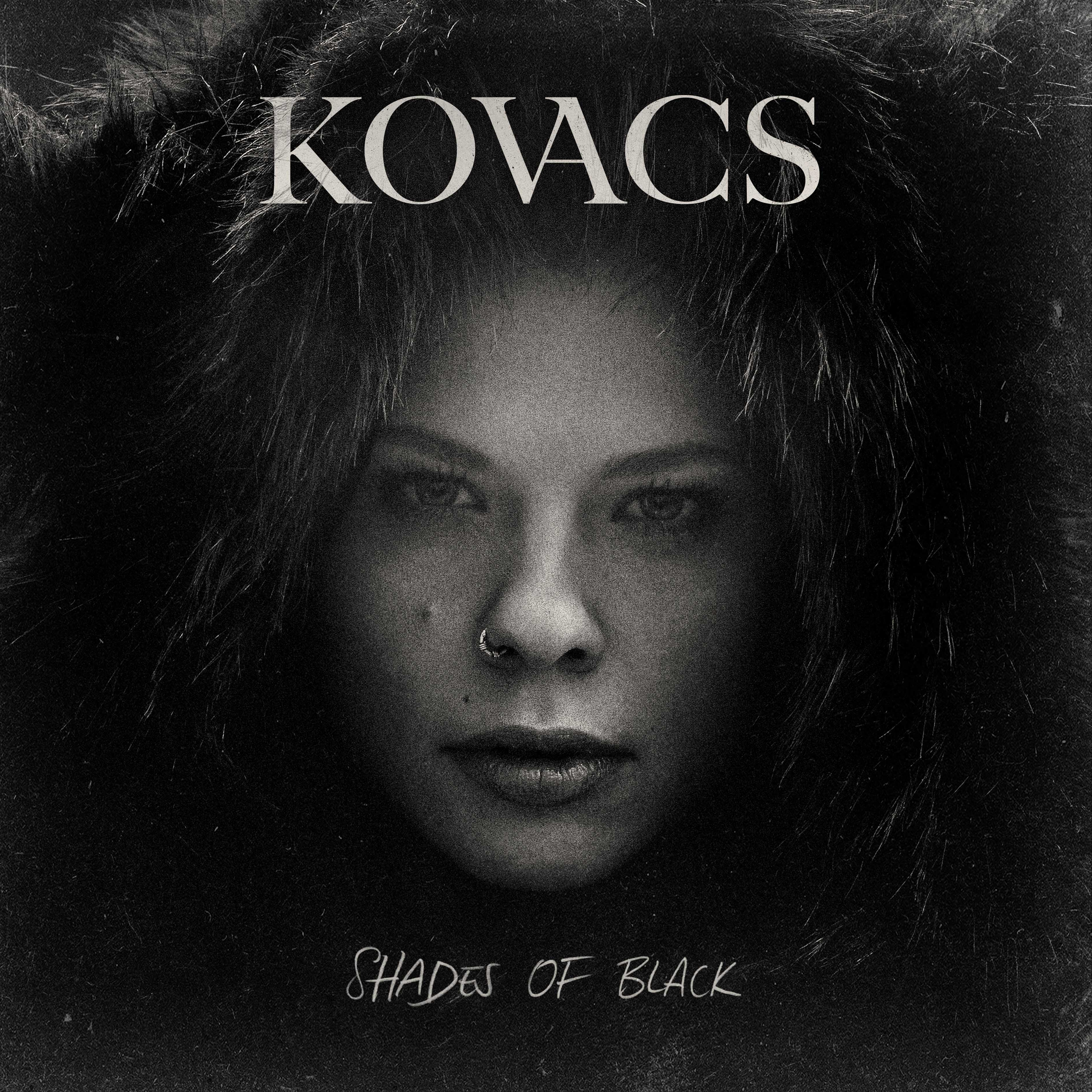 Albumcover. Eine Frau mit Nasenring, Pelzkapuze und dem Namen KOVACS. Darunter steht 'Shades of Black'.
