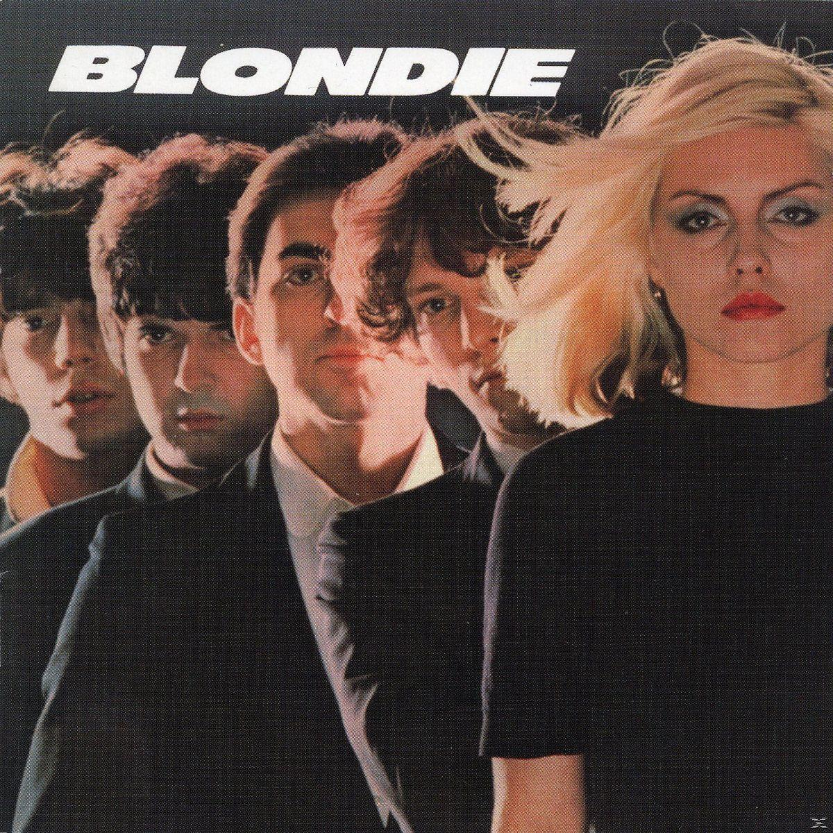 Blondie-Albumcover. Blondie in Schwarz, Bandmitglieder im Hintergrund. Retro-Stil.
