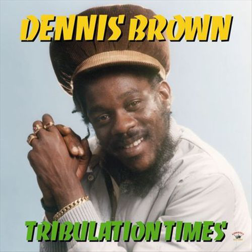 Album borító: Dennis Brown barna kalapban és szakállal. Az album címe Tribulation Times.