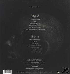Albumcover mit einem Schädel und Titelliste. Texte sind sichtbar.