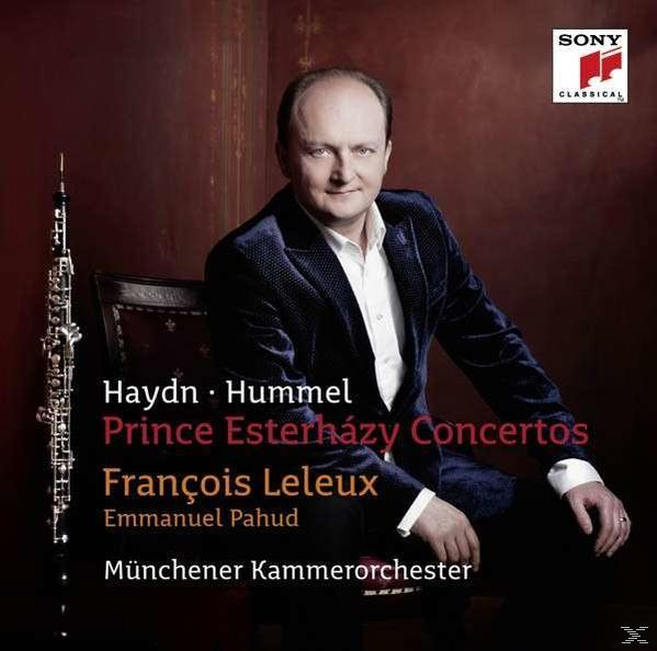 CD-Cover: Mann im Anzug mit Oboe, Text überlagert.