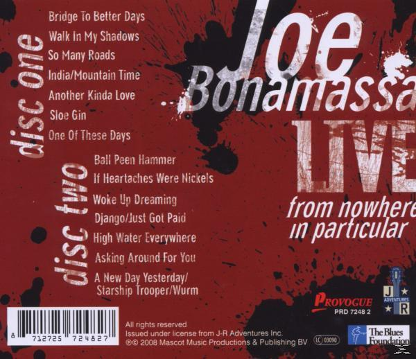 CD-Cover: Text und eine Liste von Songs und ein roter Hintergrund.