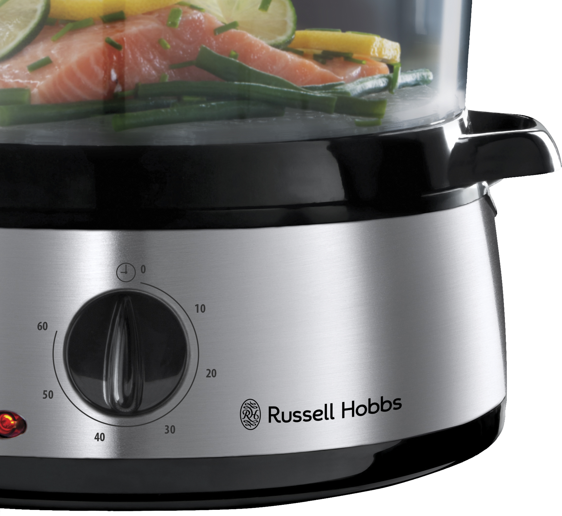 Rozsdamentes acél és fekete gőzölő, benne lazac, lime és fűszernövények. Russell Hobbs logó látható.
