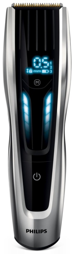 A silver and black Philips beard trimmer with a digital display.