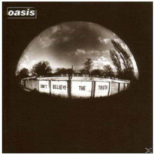 Albumcover: ein dunkles, monochromes Foto eines Gebäudes mit den Worten 'DON'T BELIEVE THE TRUTH' darauf.