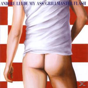 Albumcover mit dem Hintern eines Mannes und einem rot-weiß karierten Hintergrund.