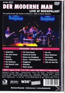 DVD-Rückseite. Konzert-Trackliste, Band auf der Bühne, Text auf Deutsch sowie DVD-Logo und -Bewertung.