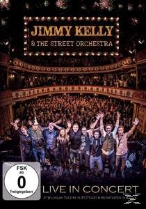 DVD-Cover für Jimmy Kelly & The Street Orchestra: Live in Concert. Musikergruppe auf der Bühne vor Publikum.