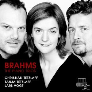 Albumcover mit drei Personen darauf. Der Titel lautet 'Brahms The Piano Trios' und die Namen der Künstler.