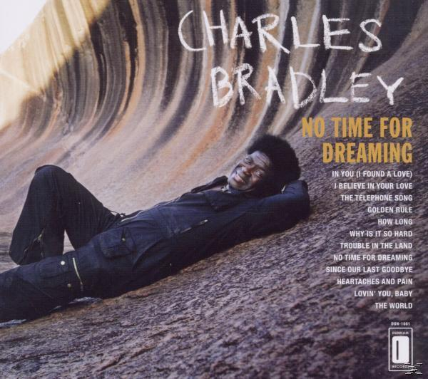 CD-Cover mit Charles Bradley auf Felsen liegend und Albumtitel.