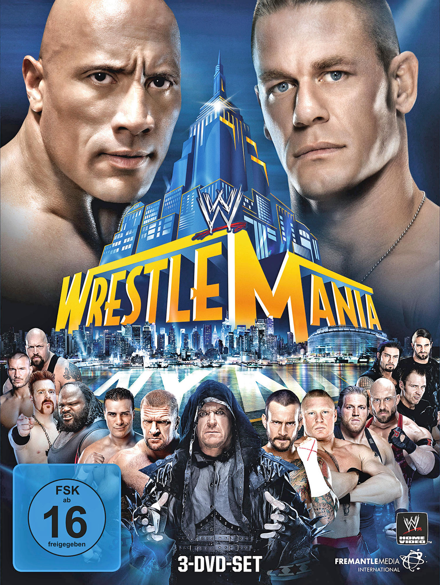 DVD-Cover mit Wrestlern, WrestleMania-Titel, blauem Stadt-Hintergrund und einem 3-DVD-Set-Label.