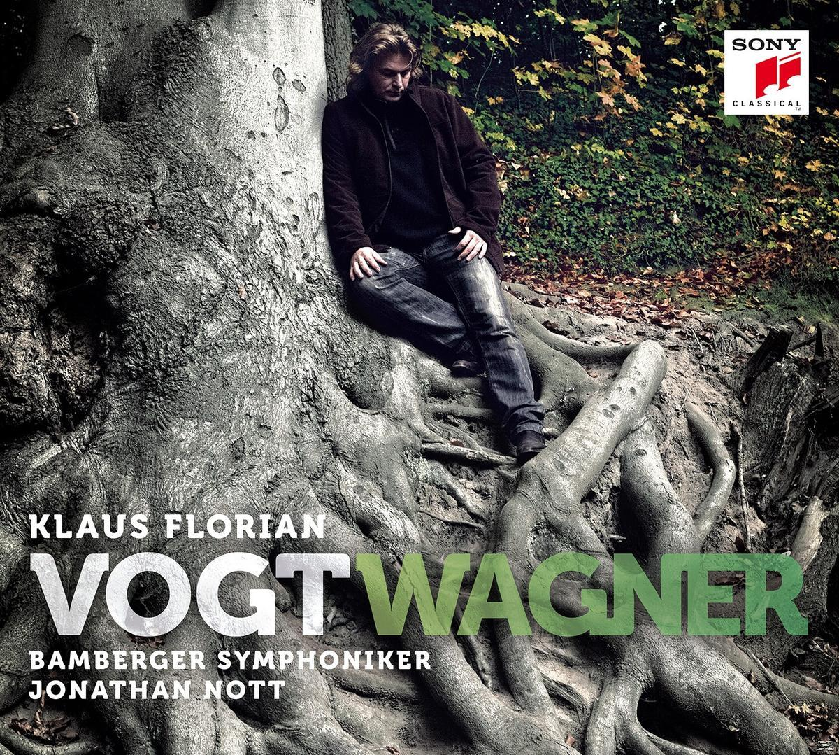 Album borító: Férfi fa gyökereken ül, Wagner, zöld és fehér szöveggel.