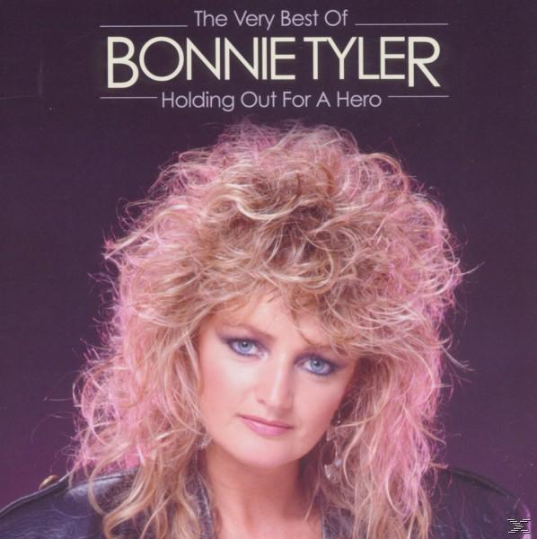 Albumcover von Bonnie Tyler. Blonde Frau mit lockigem Haar, blauen Augen. Text: The Very Best Of BONNIE TYLER, Holding Out For A Hero.