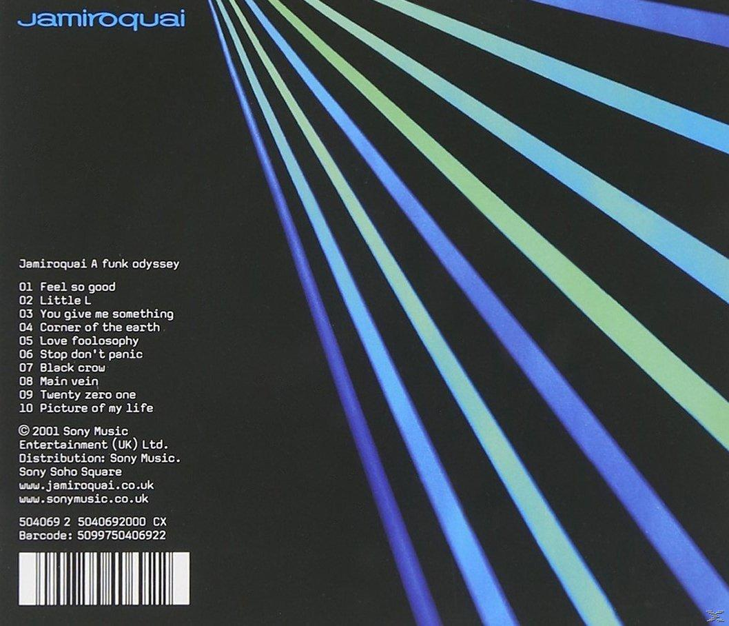 Albumcover, blaue und grüne Linien, die von oben ausstrahlen. Text: Jamiroquai, A Funk Odyssey. Trackliste.