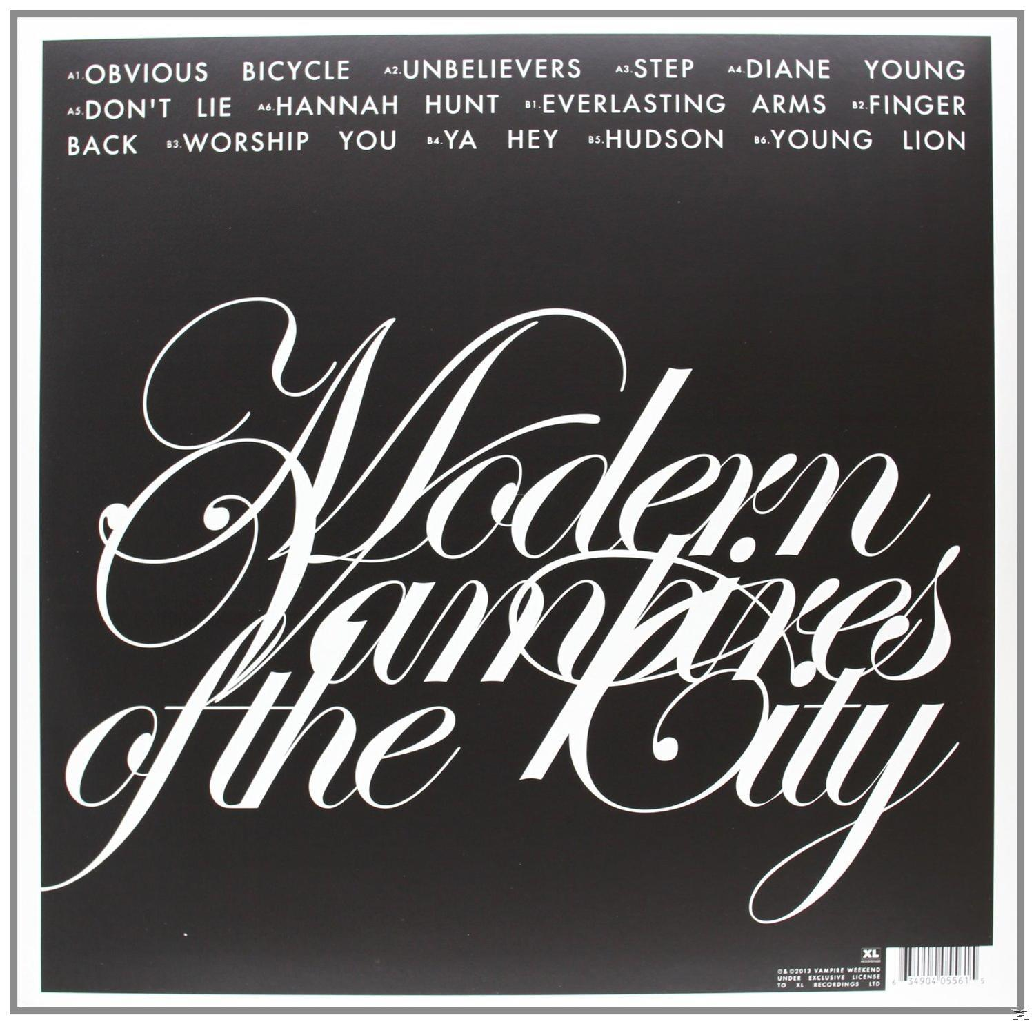 Rückseite eines Albums von Modern Vampires of the City. Weißer Text auf schwarzem Hintergrund mit Titelliste.