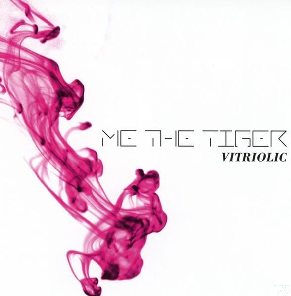 Albumcover. Rosa Tinte wirbelt auf weißem Hintergrund nach unten. Der Text lautet: "ME THE TIGER VITRIOLIC".