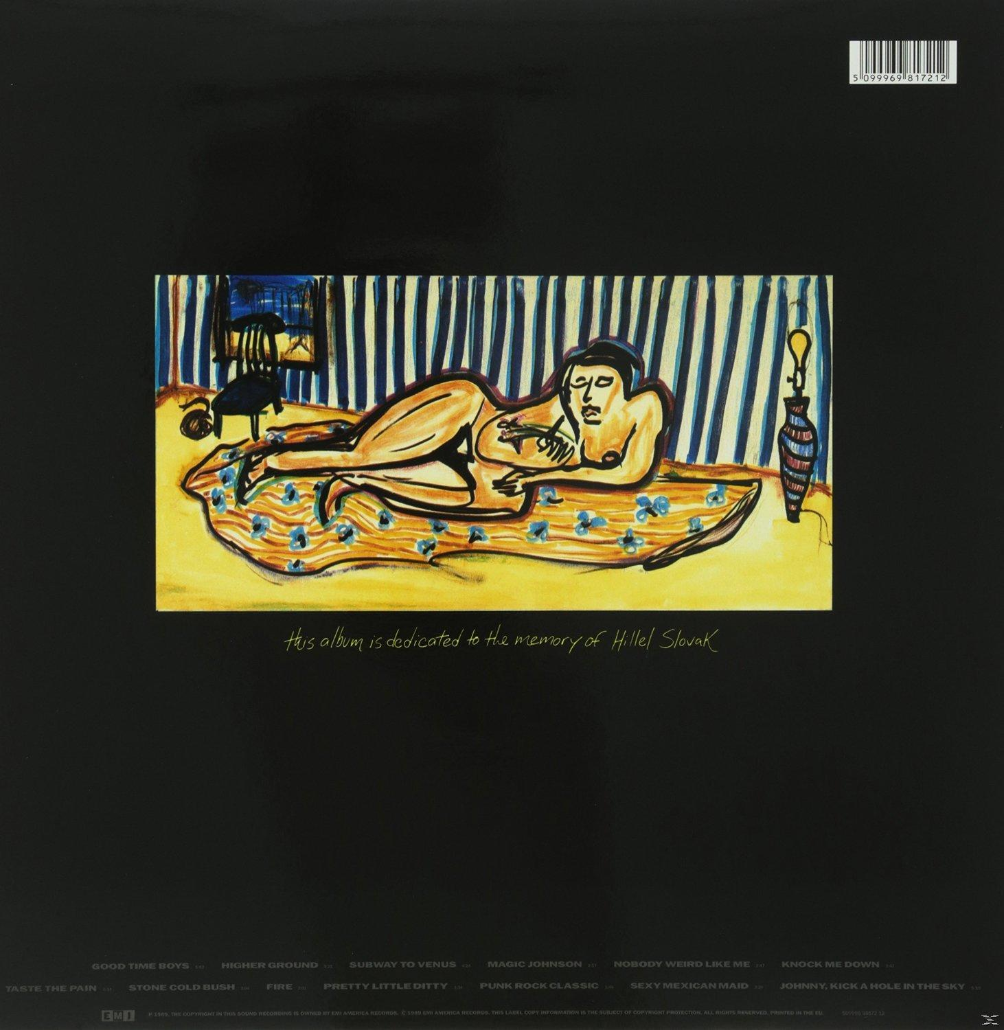 Pochette d'album avec une figure nue allongée sur un lit. Le fond est rayé.