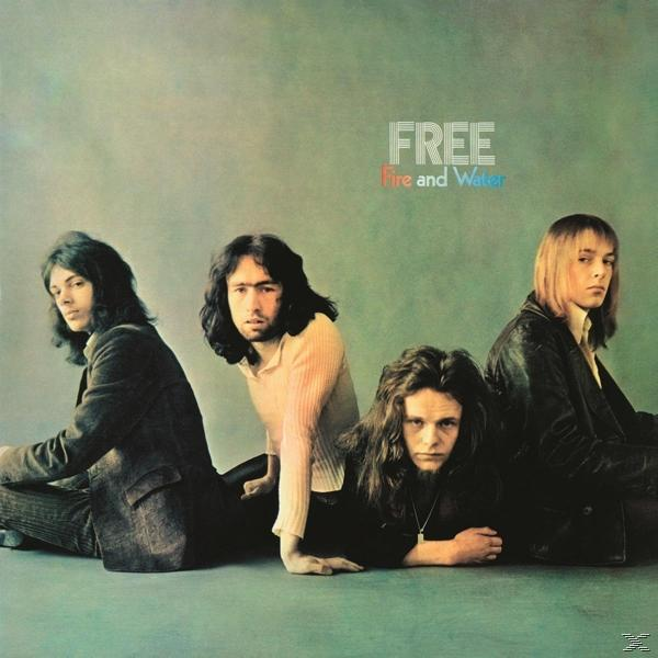 Album borítója négy férfival. Cím: FREE, Fire and Water. A zenekar tagjai szürke háttéren fekszenek.