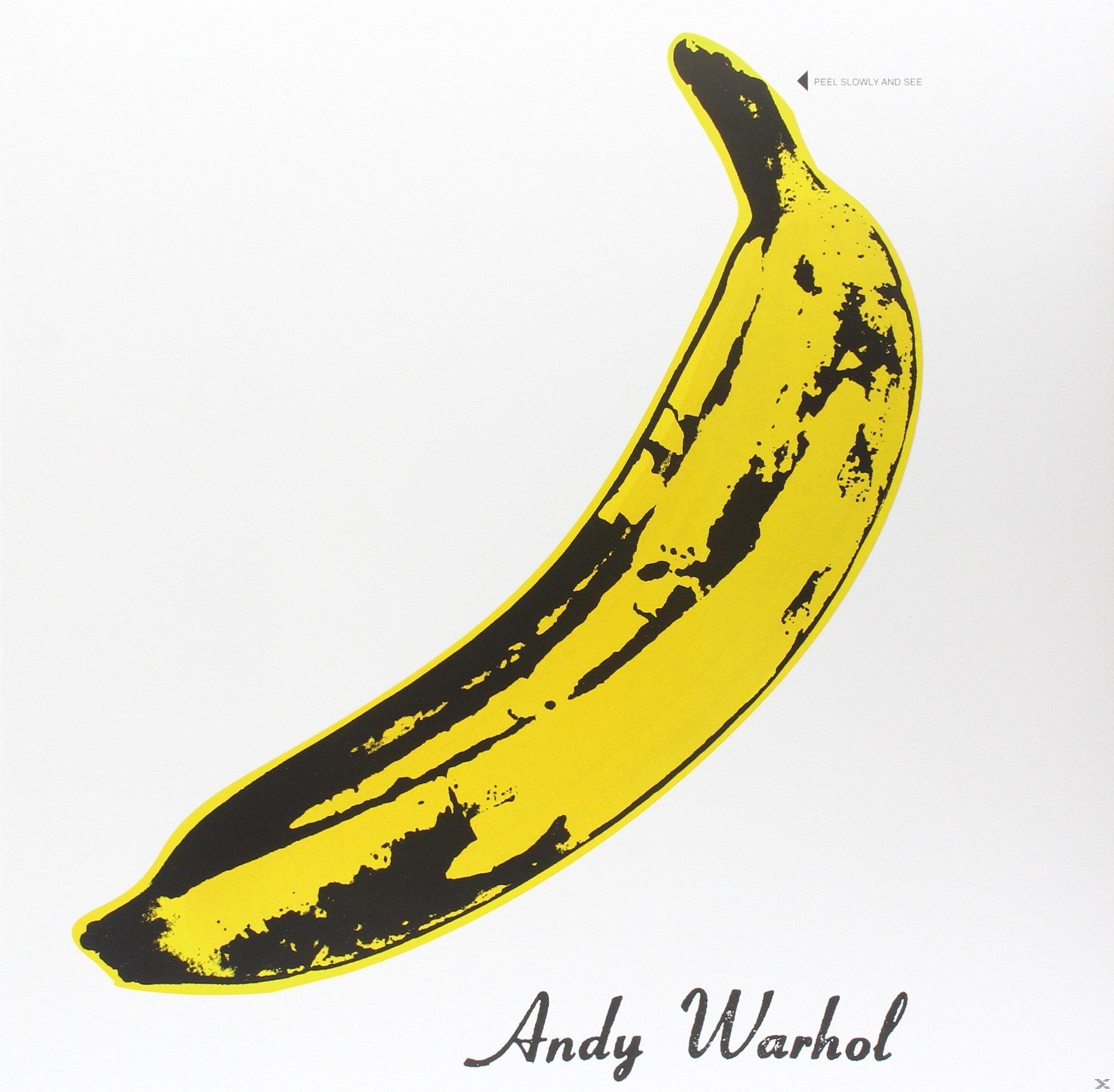 Pop-art banaan. Gele bananenschil met zwarte omtrek op een witte achtergrond. Handtekening Andy Warhol.