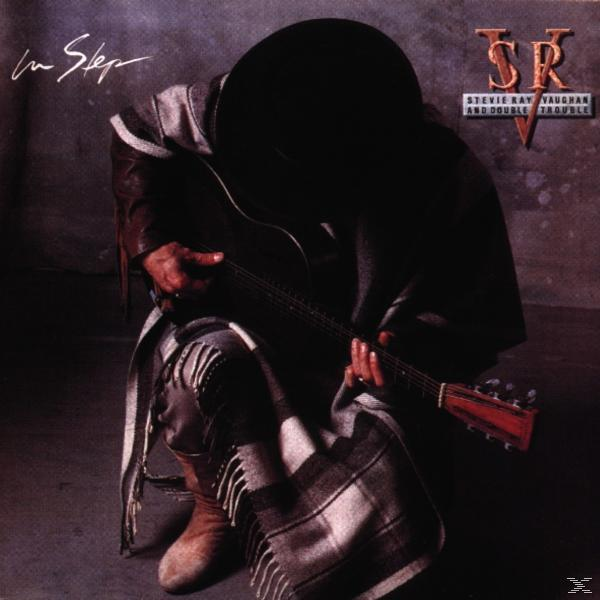 Albumcover: Musiker mit Hut spielt Gitarre, dunkler Hintergrund. Text: Stevie Ray Vaughan & Double Trouble.